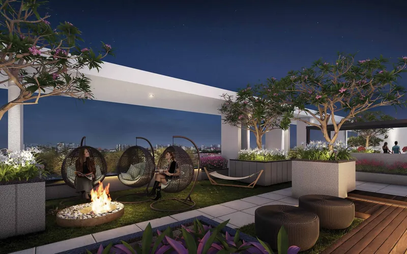 Purva Meraki: Rooftop fire pit and hanging chairs